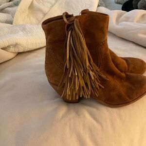 Sam Edelman suede bootie heels with brown and shiny gold tassels.